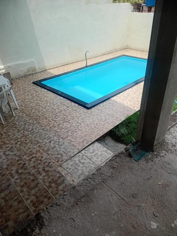 Bazén v ubytování Chácara silva nebo v jeho okolí