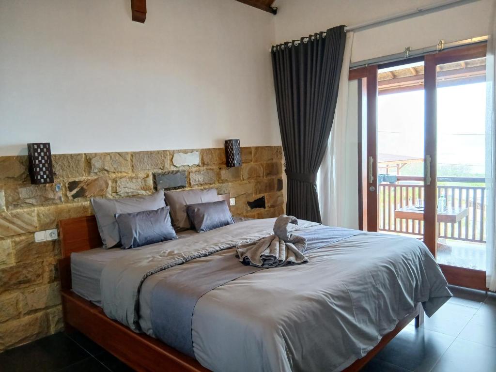 Ένα ή περισσότερα κρεβάτια σε δωμάτιο στο Lafrin Brothers