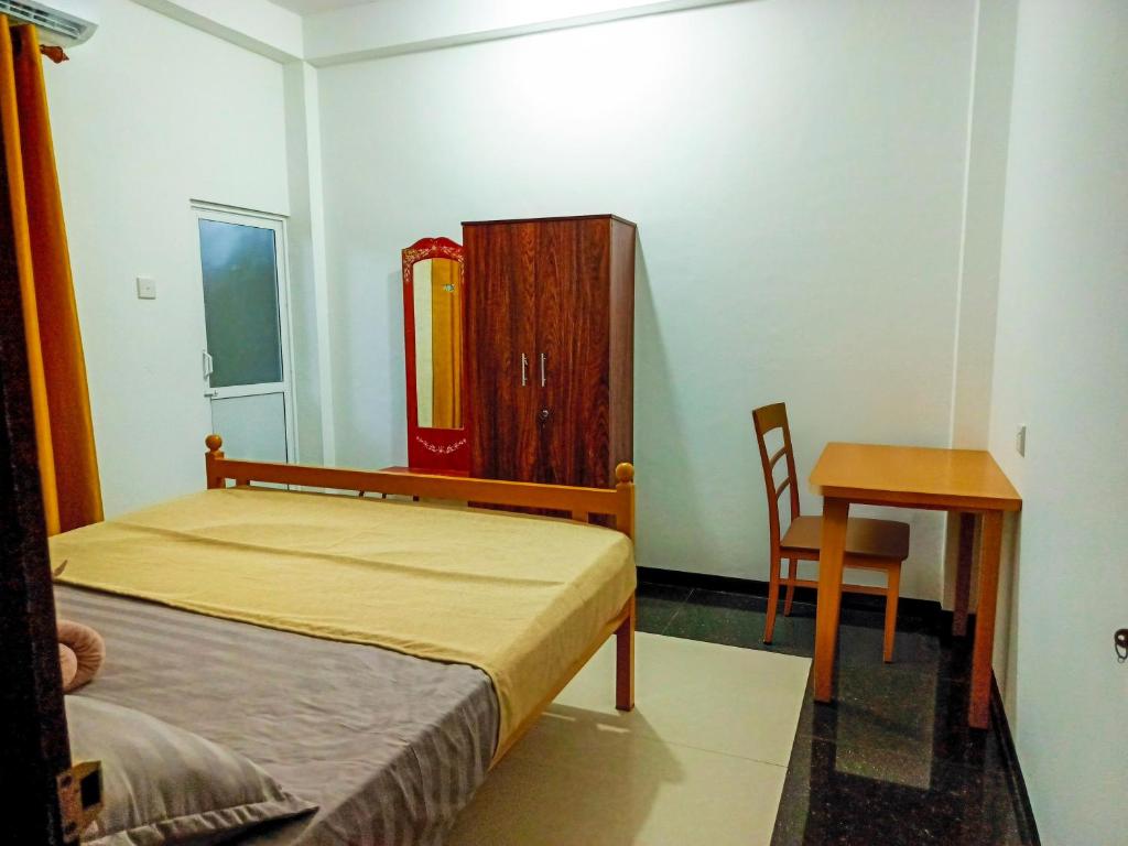 Postel nebo postele na pokoji v ubytování Villa Groveview Unawatuna