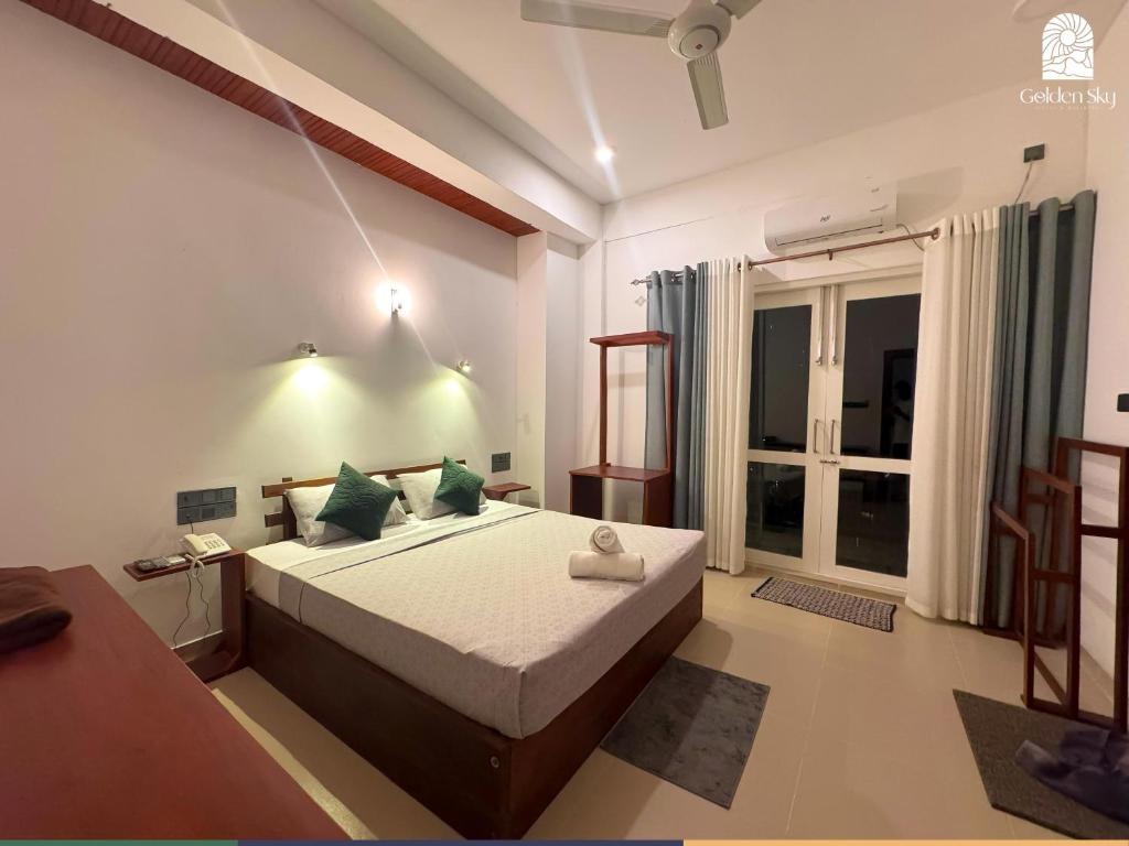 Giường trong phòng chung tại Golden Sky Hotel & Wellness