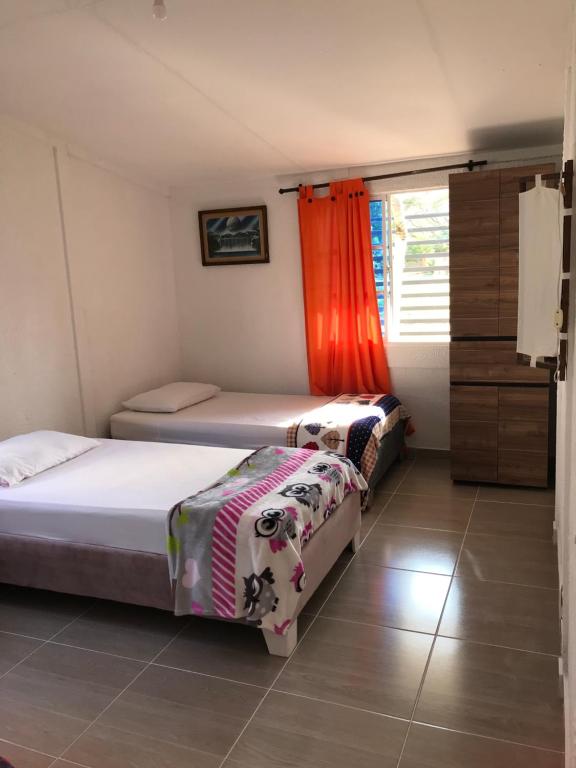 Ένα ή περισσότερα κρεβάτια σε δωμάτιο στο Santa Verónica Beach House