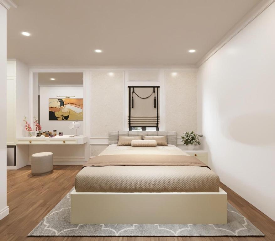 Postel nebo postele na pokoji v ubytování The Serenity Residence Ha Noi