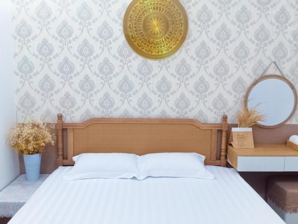 Postel nebo postele na pokoji v ubytování Hoàng Nga Apartment Phan Thiết