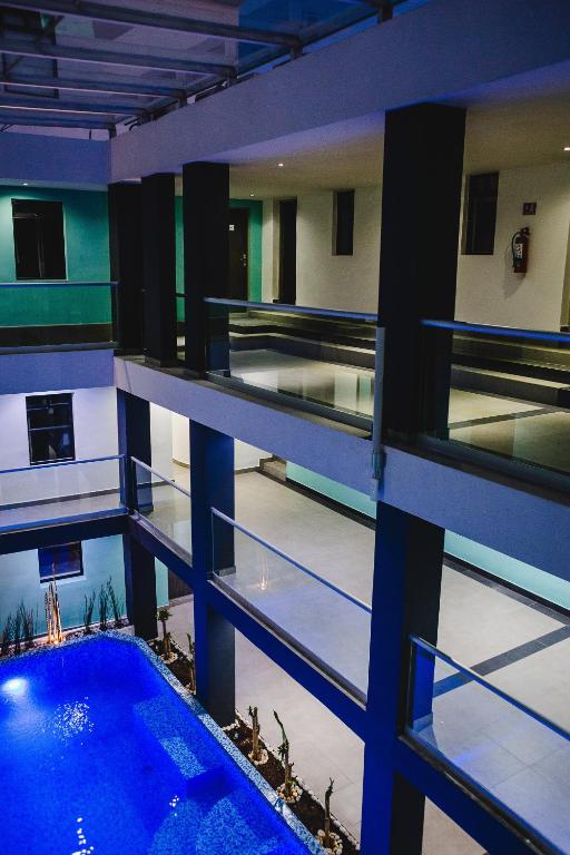 Bazén v ubytování Hotel Flamingo Merida nebo v jeho okolí