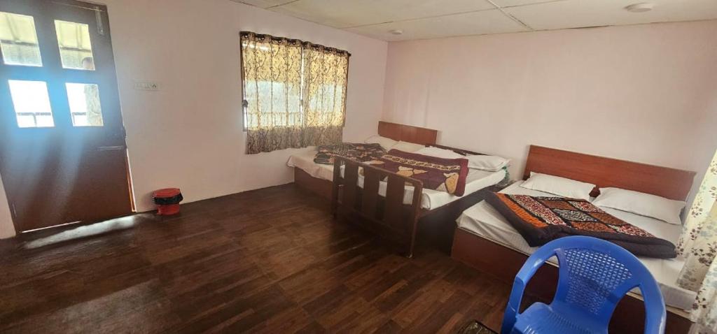 Postel nebo postele na pokoji v ubytování The Kodai Mist Valley