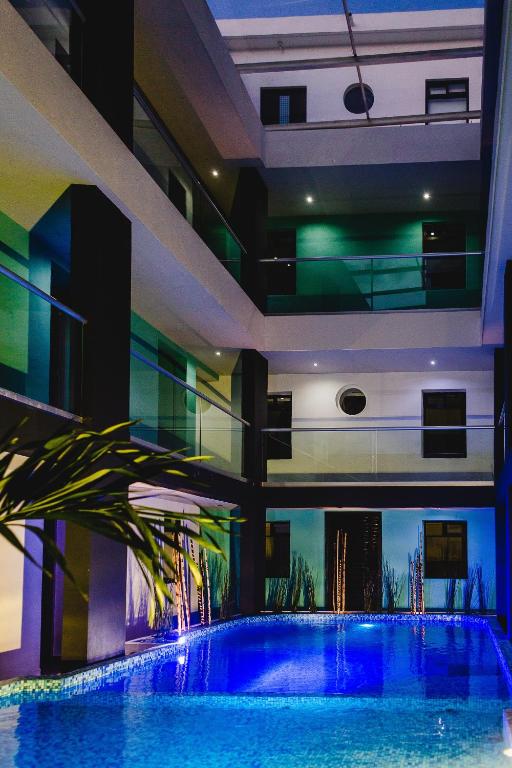 Bazén v ubytování Hotel Flamingo Merida nebo v jeho okolí