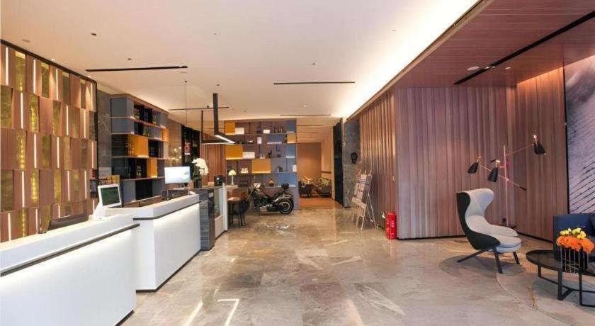 Posezení v ubytování Echarm Hotel Jinan West Station International Exhibition Center