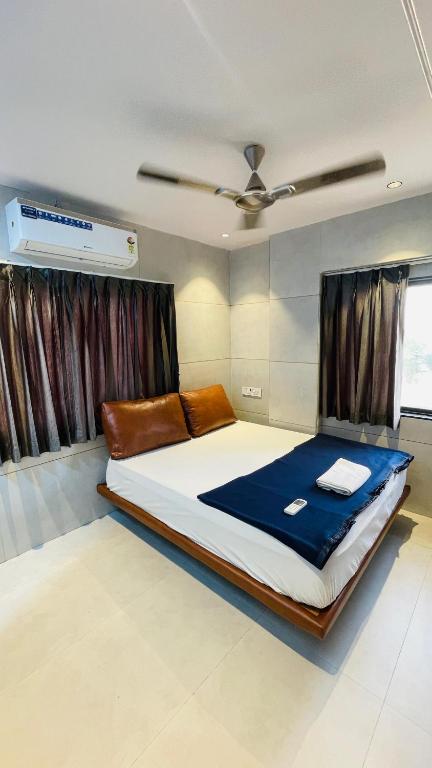 Ένα ή περισσότερα κρεβάτια σε δωμάτιο στο Hotel Laa'more