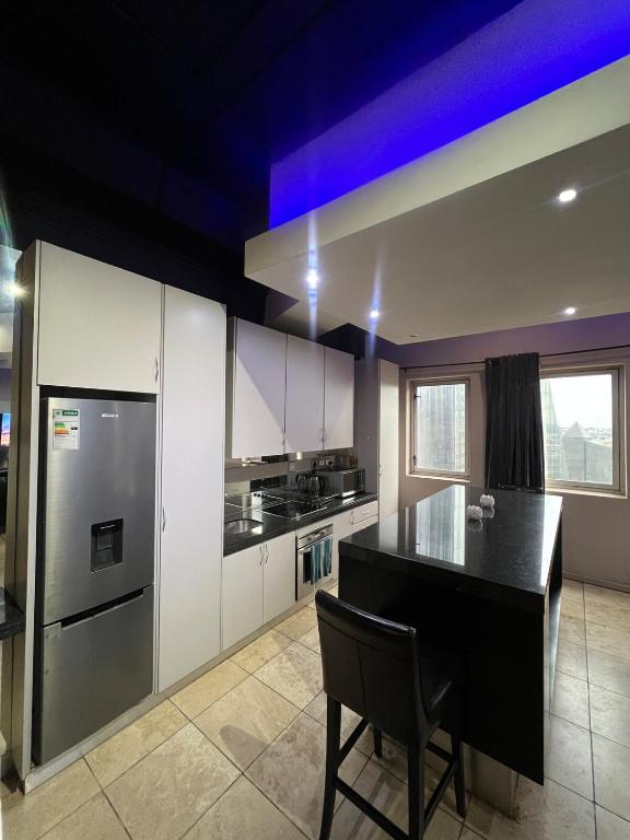 Kuchyň nebo kuchyňský kout v ubytování Nine O four