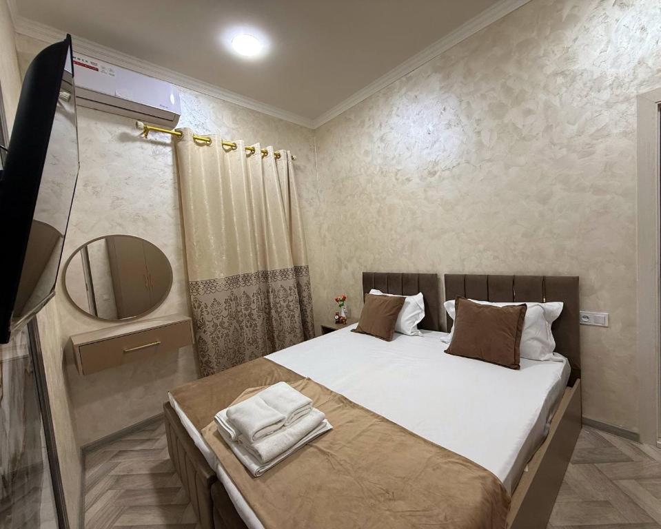 Postel nebo postele na pokoji v ubytování Art Home Hotel