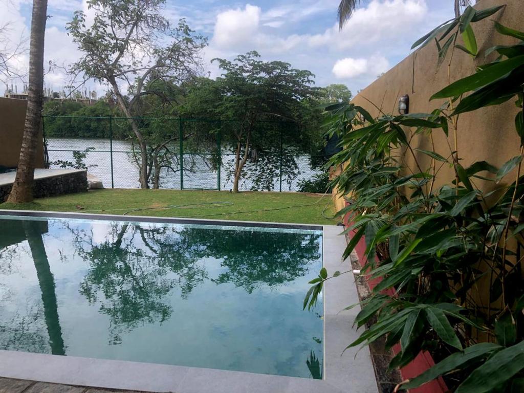 Bazén v ubytování Sithagi River Front nebo v jeho okolí