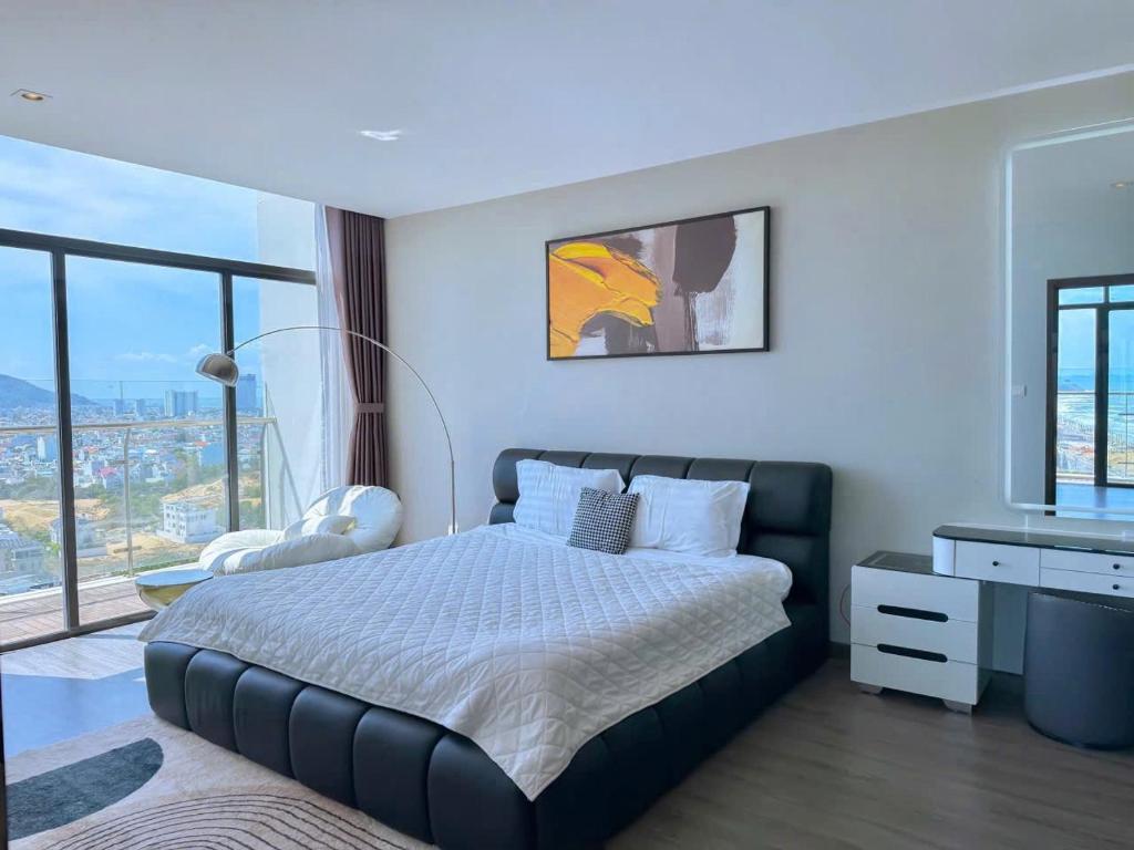 Postel nebo postele na pokoji v ubytování CSJ TOWER APARTMENT VŨNG TÀU - Căn Hộ Du Lịch Sát Biển Bãi Sau