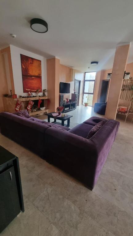 TV a/nebo společenská místnost v ubytování Casa padurii