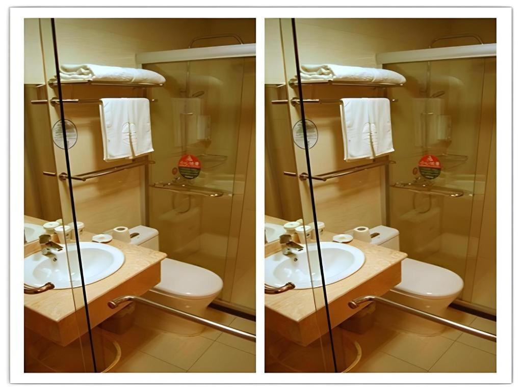 two pictures of a bathroom with a sink and a toilet at GreenTree Inn Shanghai South Railway Station Xujiahui Stadium Subway Station Shell Hotel in Shanghai