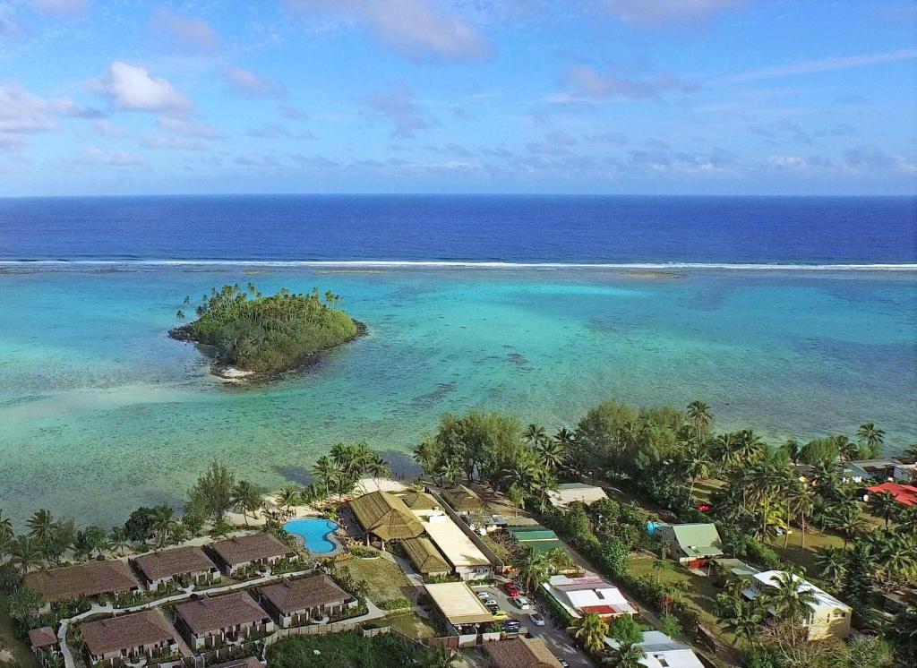 an aerial view of a resort in the ocean at Nautilus Resort in Rarotonga