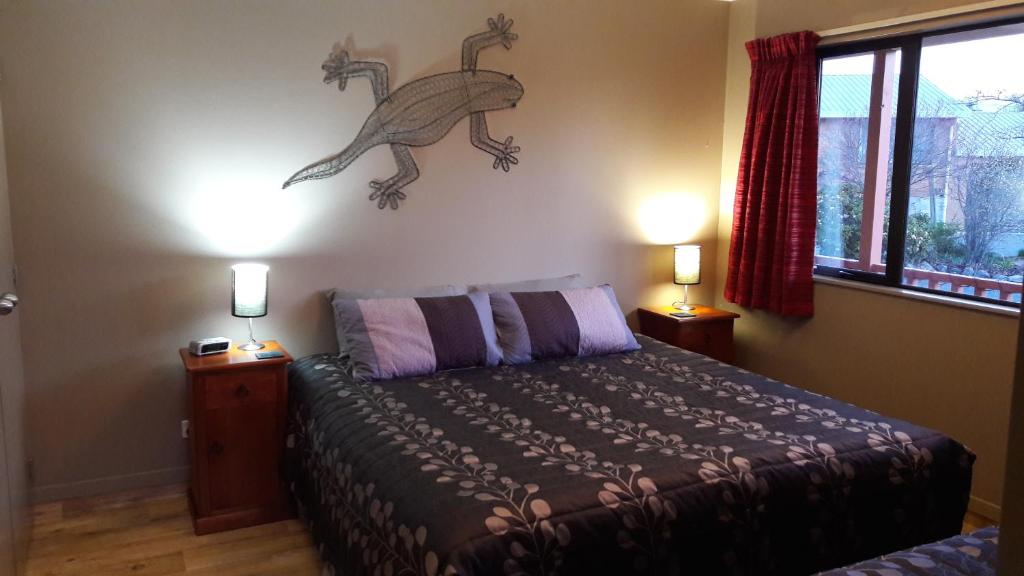 Postel nebo postele na pokoji v ubytování Serenity Motels