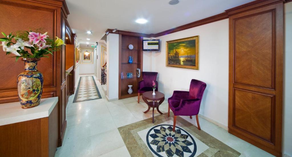 Posezení v ubytování GLK PREMIER The Home Suites & Spa