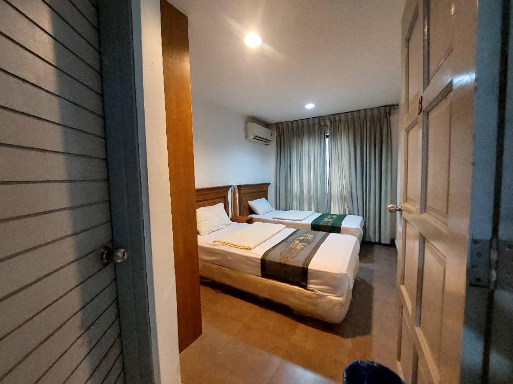 Postel nebo postele na pokoji v ubytování J Hotel Bukit Bintang