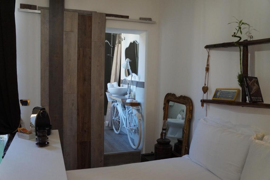 Posteľ alebo postele v izbe v ubytovaní Jacuzzi Rooms