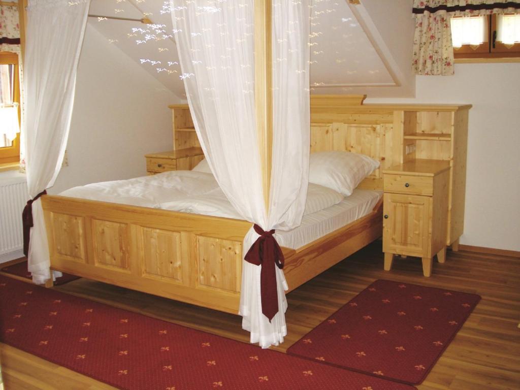 Postel nebo postele na pokoji v ubytování Arberschutzhaus