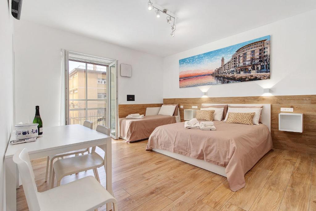 Postel nebo postele na pokoji v ubytování Platinum - Il Centro Luxury Suites