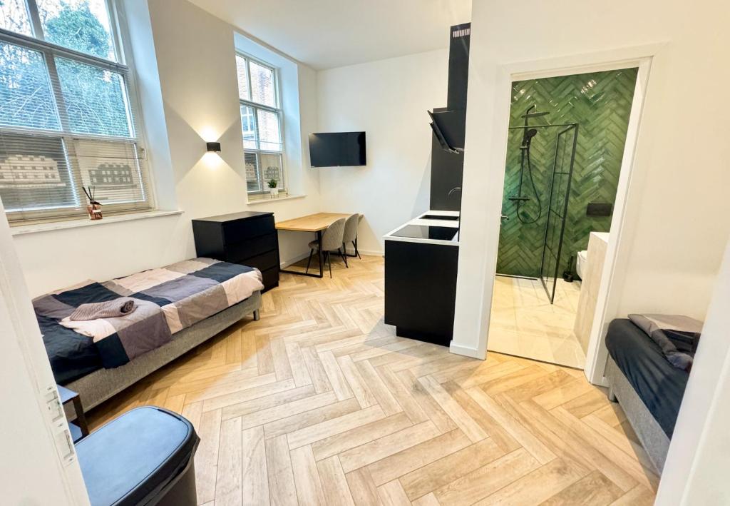 Postel nebo postele na pokoji v ubytování 52-1 - Luxe studioappartement 2 gasten