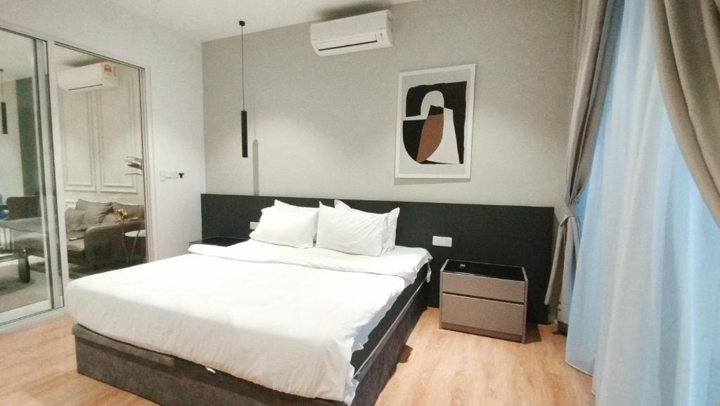 Postel nebo postele na pokoji v ubytování Quill Residence KL Suites