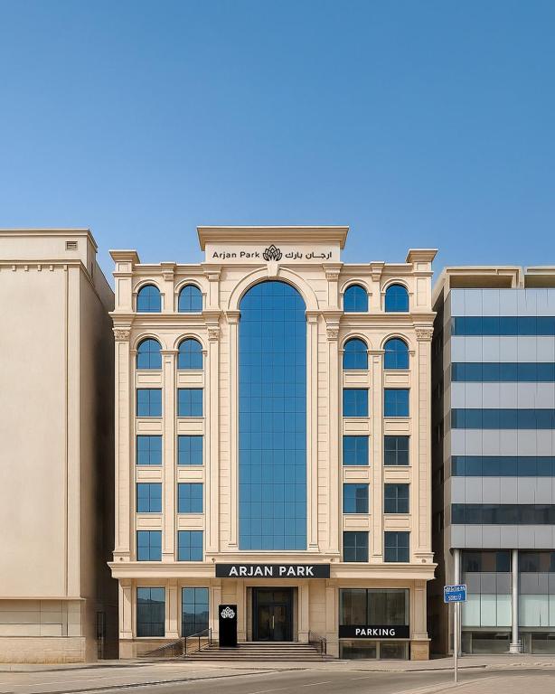 a large building with an arch in front of it at فندق ارجان بارك جدة in Jeddah