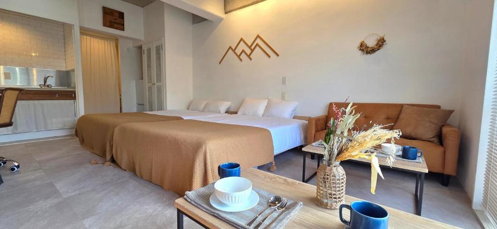 Postel nebo postele na pokoji v ubytování Prince Plage Okinawa 406 PP46