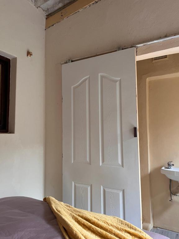 Ένα ή περισσότερα κρεβάτια σε δωμάτιο στο Sunwich Beach Home