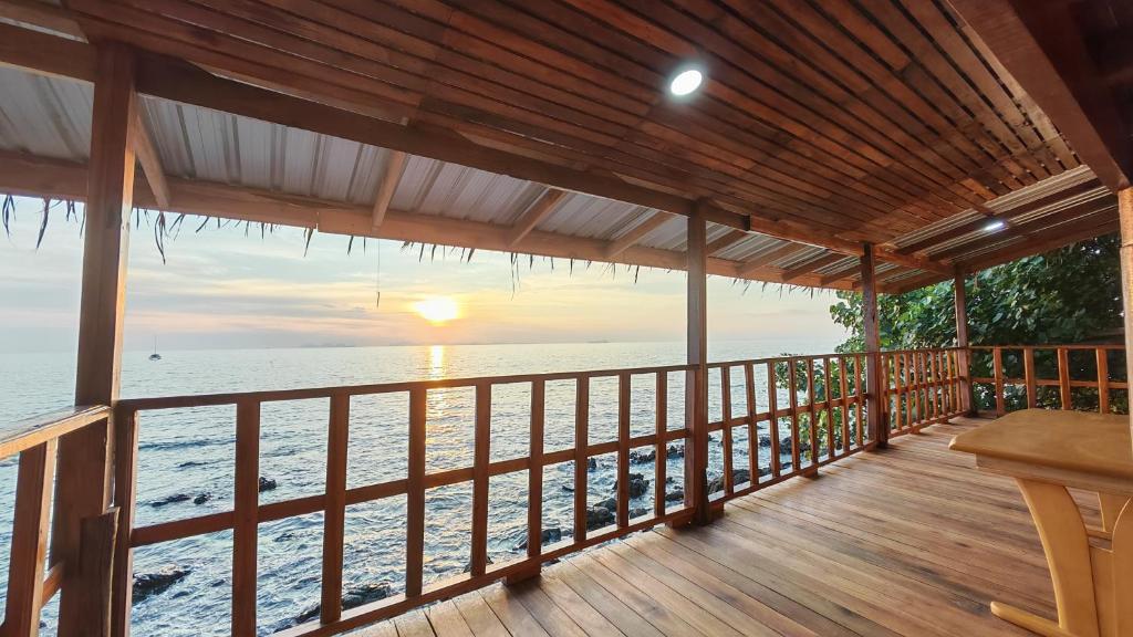 a view of the ocean from the deck of a house at Velora Bay Koh Jum in Ko Jum