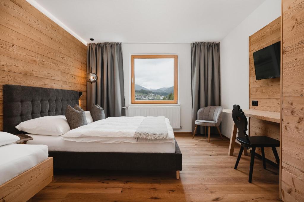 Postel nebo postele na pokoji v ubytování Stoacherhof Apartments