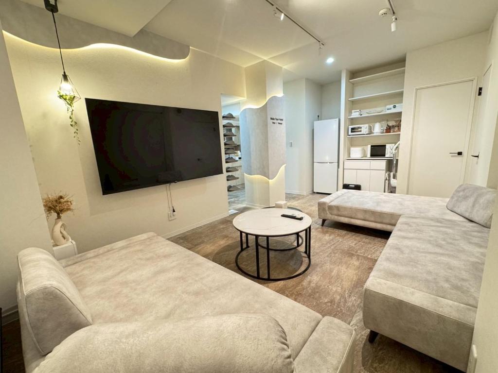 Kuchyň nebo kuchyňský kout v ubytování Make Your Hotel ShinjukuYotsuya