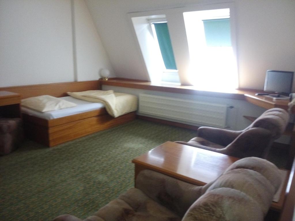 TV a/nebo společenská místnost v ubytování Hotel BESTAR