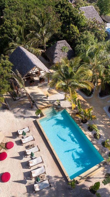 an overhead view of a swimming pool at a resort at Hostel 197 in Nungwi