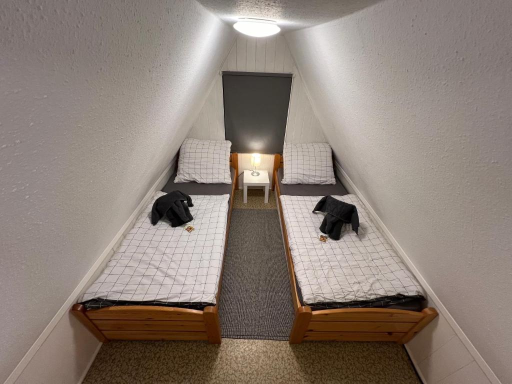 Postel nebo postele na pokoji v ubytování Finnhütte Louise am Storkower See