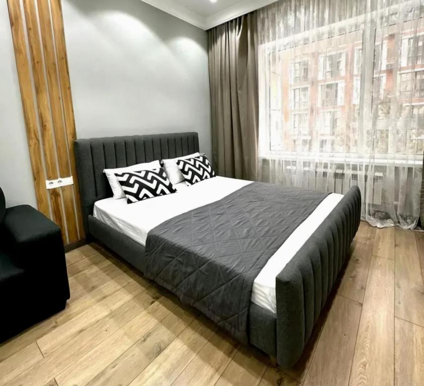 Ένα ή περισσότερα κρεβάτια σε δωμάτιο στο Urban apartment for 6 person in 4YOU Residence