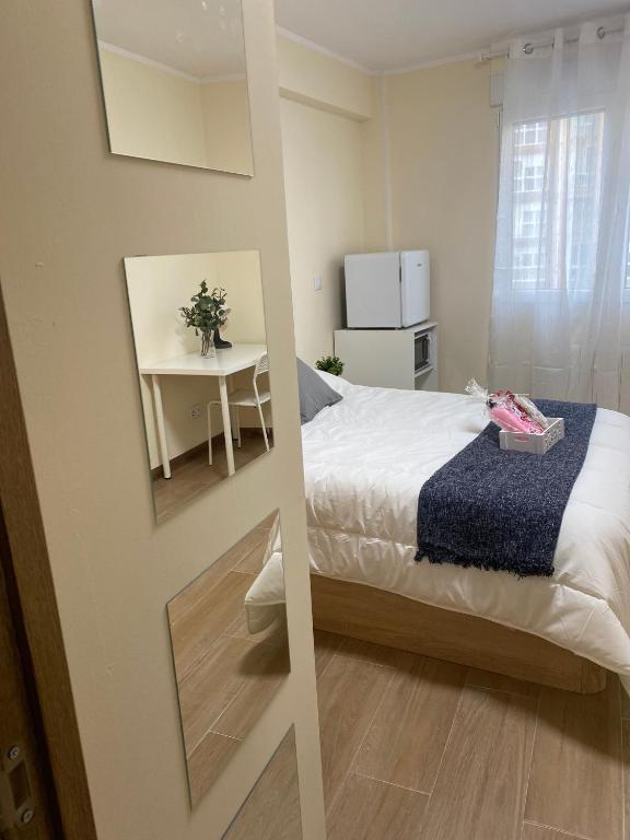 Postel nebo postele na pokoji v ubytování LOFT Céntrico MALIAÑO - DUA ROOMS