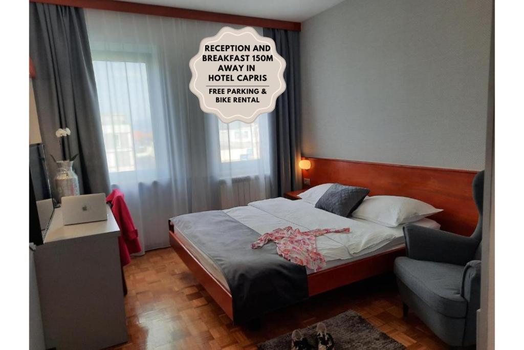 Postel nebo postele na pokoji v ubytování Rooms Vodisek - Depandansa Hotela Capris Capodistria Boutique