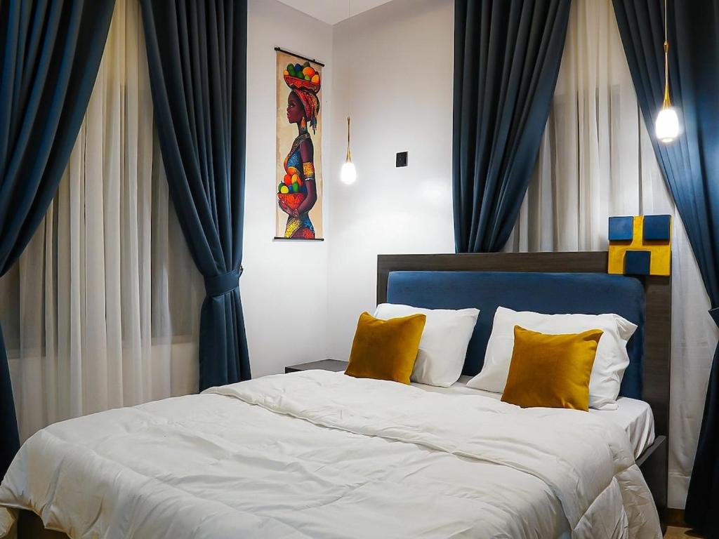 Ένα ή περισσότερα κρεβάτια σε δωμάτιο στο De Richmond Court