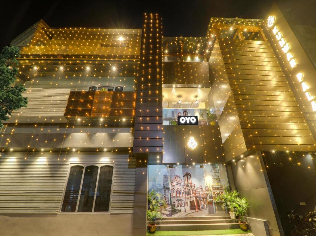 a building with lights on top of it at night at Super Hotel O Centrum in Gorakhpur