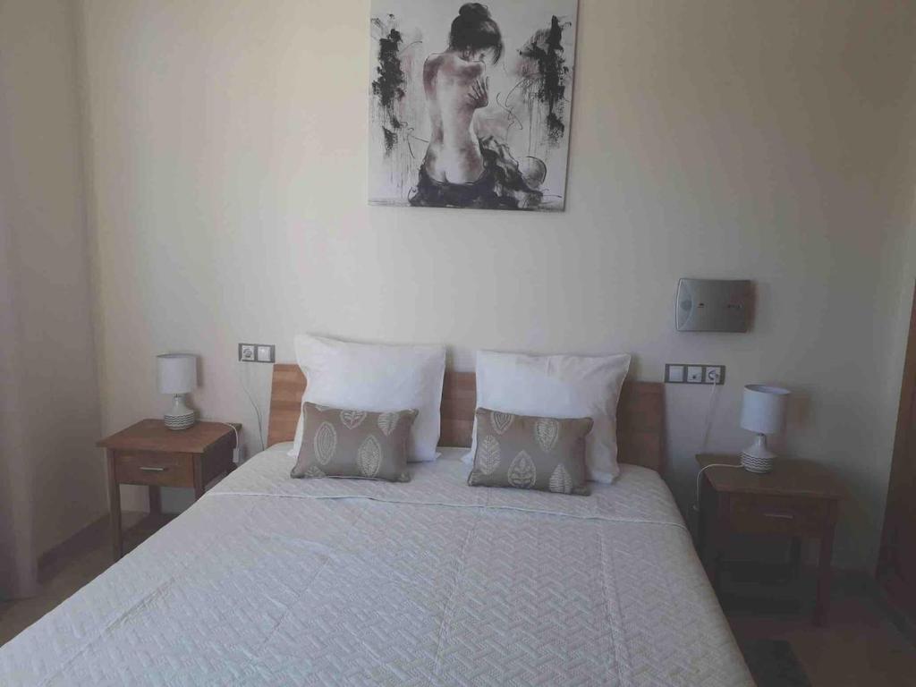 En eller flere senge i et værelse på Casa María Ronda con parking