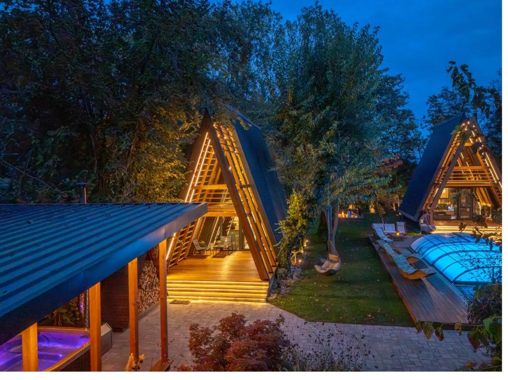 a view of a tent with a table and benches at Meszes Twins in Kalocsa