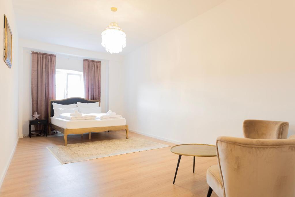 Postel nebo postele na pokoji v ubytování ღLiboria Villa Münter