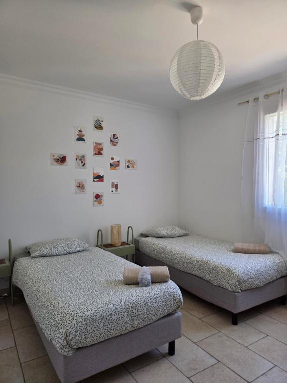 Voodi või voodid majutusasutuse Jolie maison 8 pers à Monteux 10min d'Avignon toas