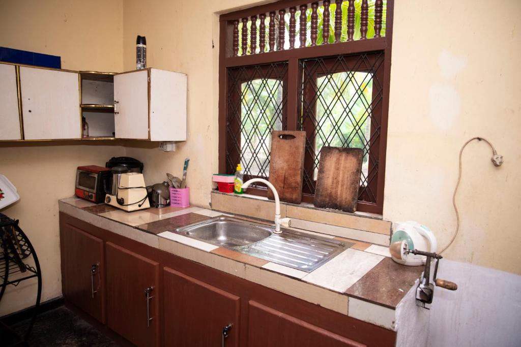 Kuchyň nebo kuchyňský kout v ubytování Lay By River Dambulla