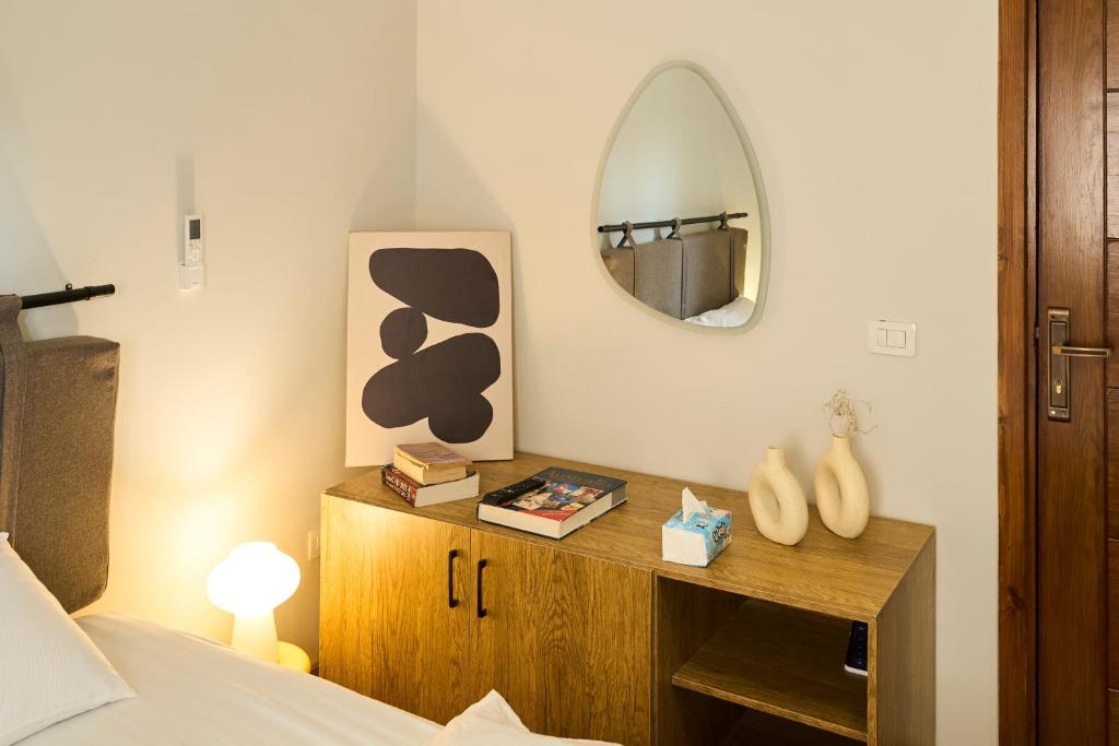 Ένα ή περισσότερα κρεβάτια σε δωμάτιο στο Jira Inn Hotel - چيران