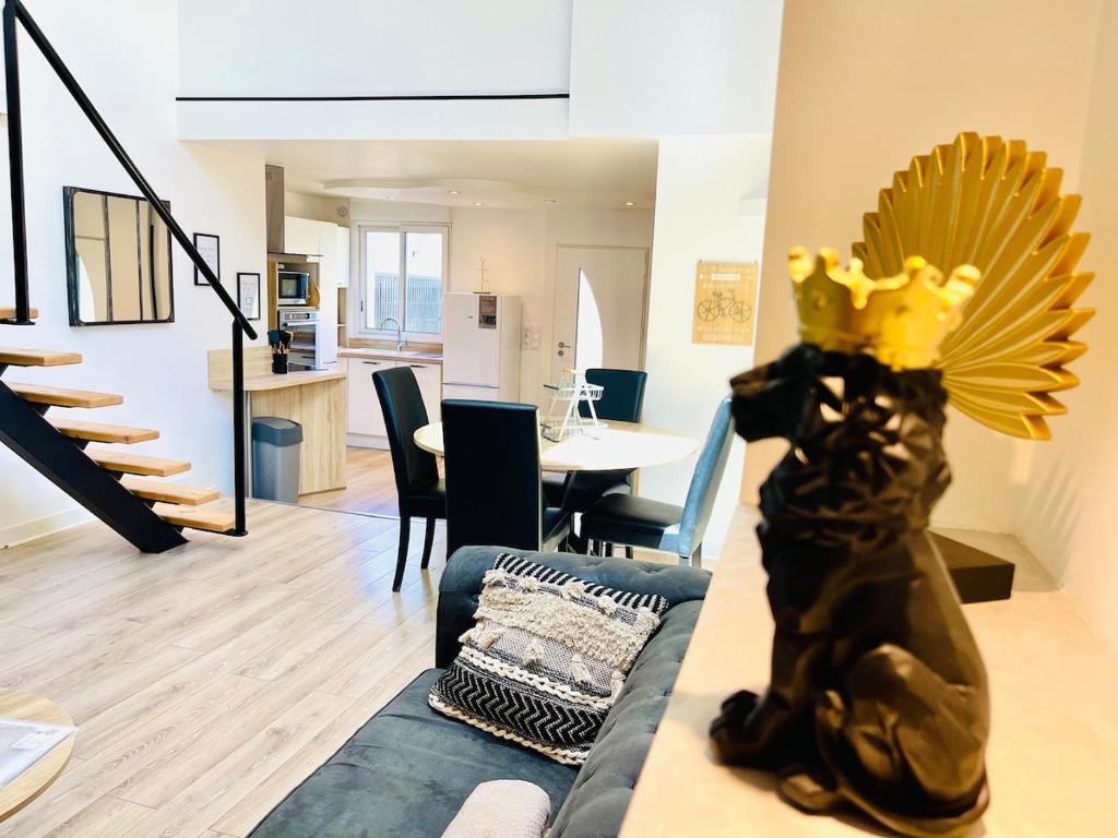 Posezení v ubytování Loft de charme avec parking, jardin et terrasse