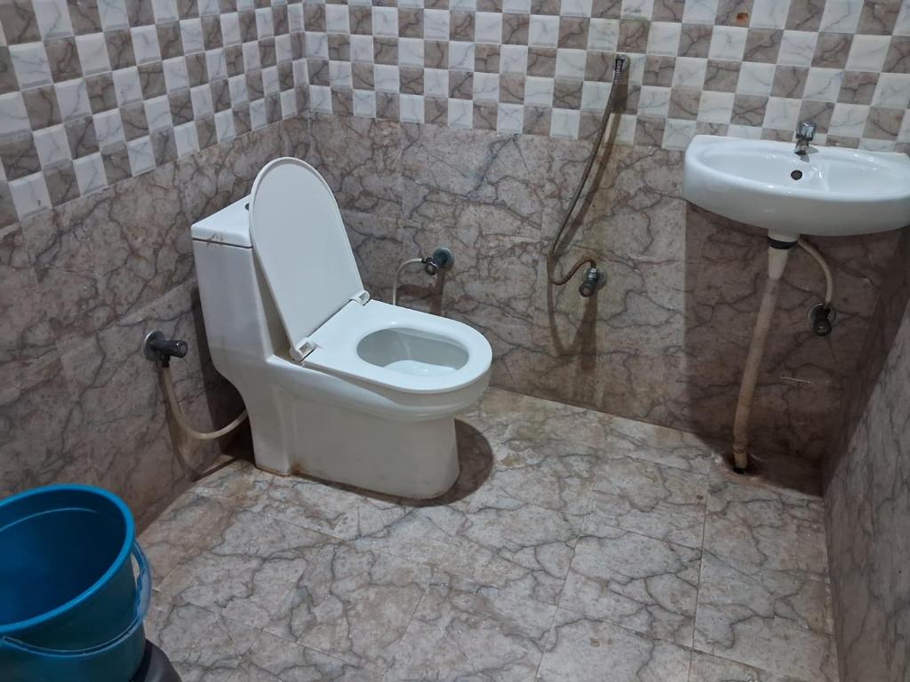 Koupelna v ubytování Hotel Pyaremohan