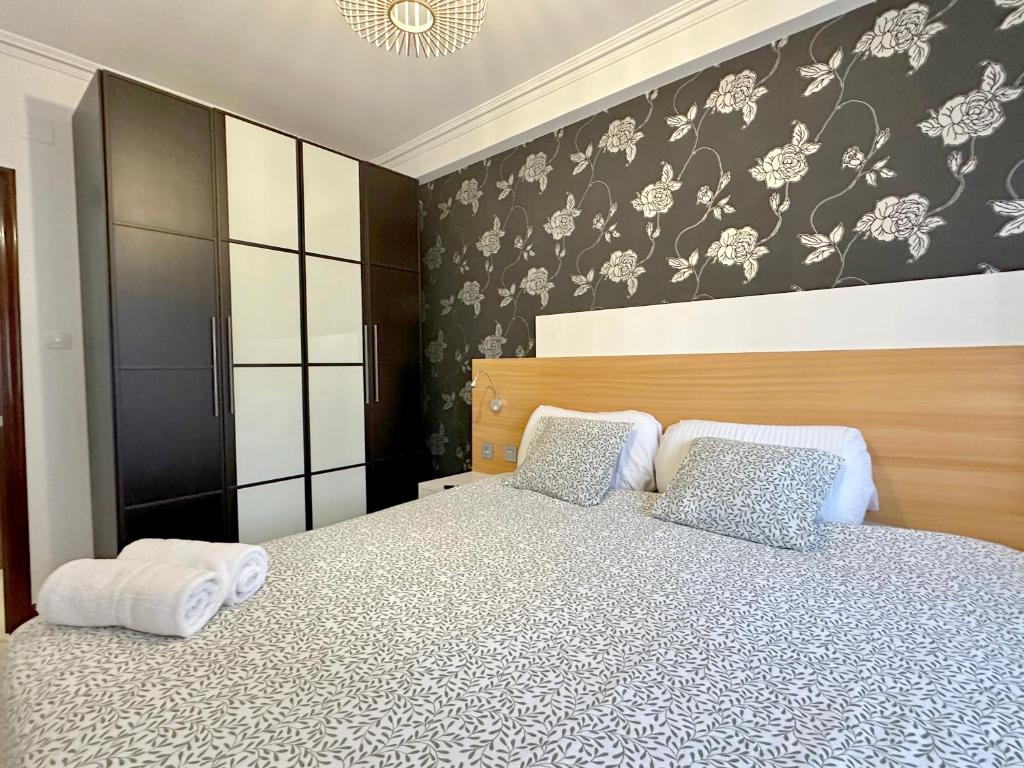 Postel nebo postele na pokoji v ubytování Santuchu Apartamento Elegante con wifi